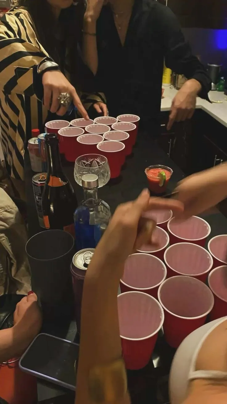 A table of red cups at a house party