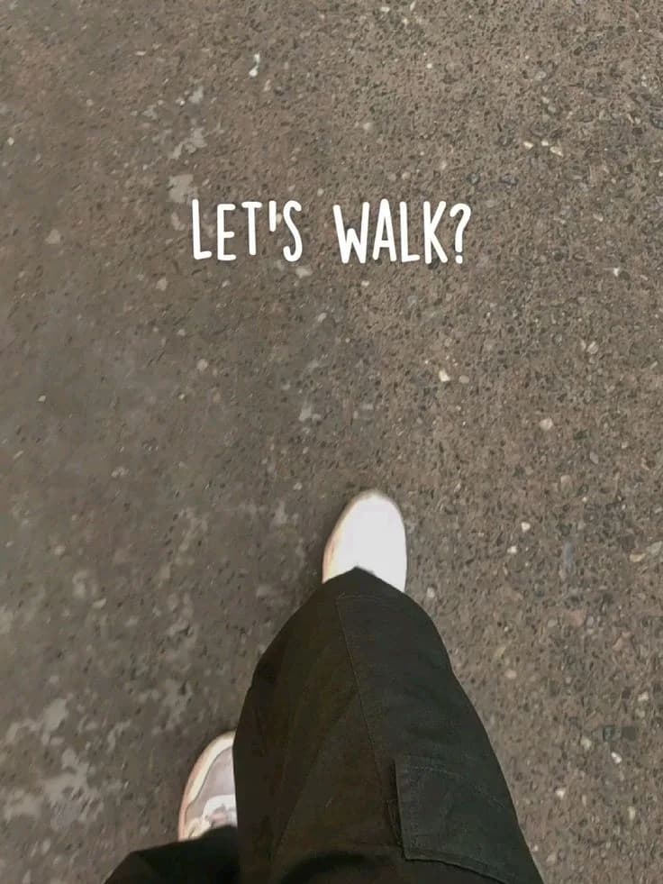 Sneakers on pavement under the words “let’s walk?”